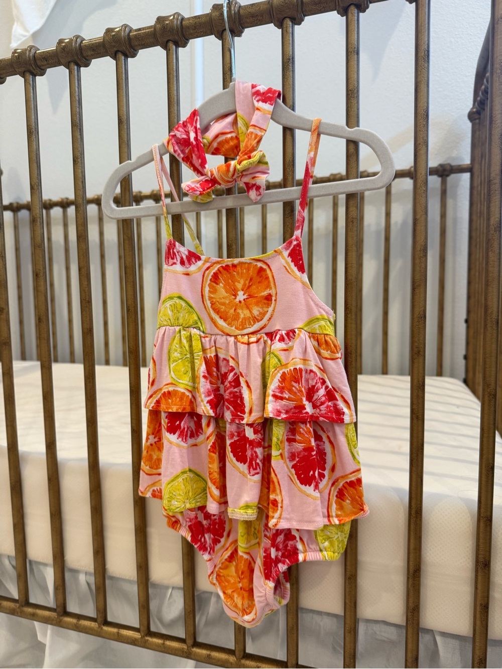 Posh Peanut Pink Citrus Print Ruffle One-Piece Bodysuit